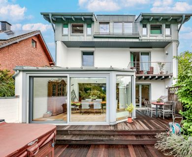 Familientraum mit Wintergarten, Kamin und schönem Garten