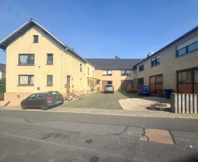 *RESERVIERT* Solides 5 Parteienhaus mit Gewerbehalle in guter Lage vor Limburg a. d. Lahn!