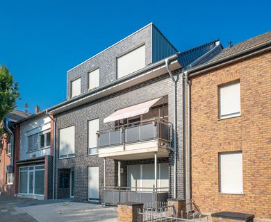 Helle Erdgeschosswohnung mit sonniger Terrasse, offenem Wohnkonzept und barrierearmer Gestaltung