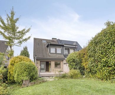 Attraktive Doppelhaushälfte mit Garage und Gartenidylle in Ratingen-Homberg