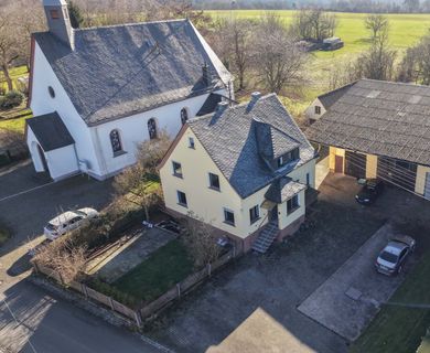 Einfamilienhaus mit großem Nebengebäude – großzügiges Grundstück inklusive!