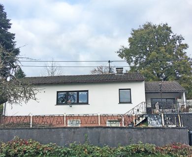 Bungalow mit Blick auf den eigenen Baum