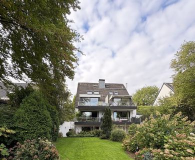 Ihre Wellness-Oase in Wittlaer: Große 3-Zimmer-Wohnung mit Garten, Sauna und Kamin.