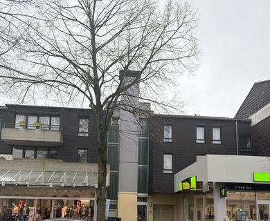 Anlageobjekt: Vermietete 2-Zimmer-Stadtwohnung mit Einbauküche, Balkon, Aufzug  und  TG-Stellplatz