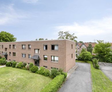Modernisierte 3-Zimmer-Wohnung mit großem Balkon und Garage