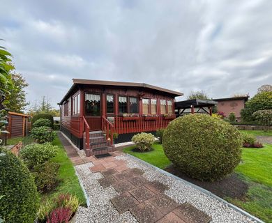 Kleines, charmantes Holzhäuschen mit liebevoll angelegtem Garten im Mobilheimpark – nahe Wissen!