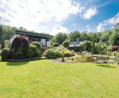 Großzügiger Bungalow mit Einliegerwohnung in bester Lage von Ratingen-Ost!