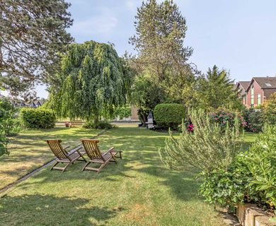 Ein Familiennest direkt am Wasser – Reihenhaus mit Garage im Grachtenviertel