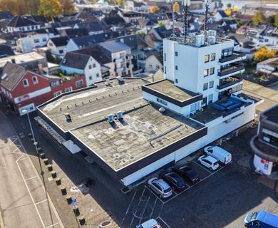 Attraktives Wohn- & Geschäftshaus in zentraler, bevorzugter Lage mit solider Mieterstruktur!