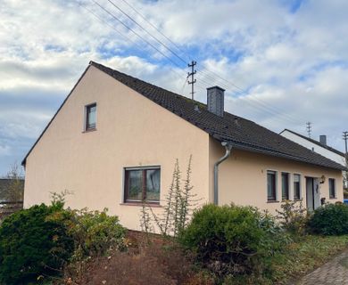 Charmanter Bungalow mit offenem Wohnbereich und Partykeller!