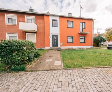 Charmante Doppelhaushälfte mit Garten, Anbau & Garage – Platz für Familie & Ideen